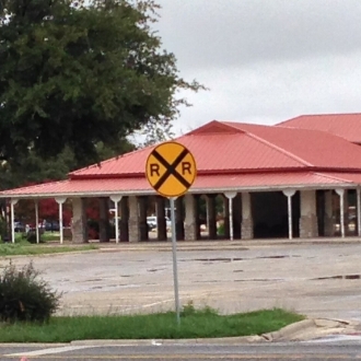 SAN ANGELO PASEO with RR crossing sign